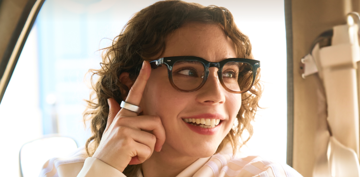 Girl using Smart AI Glasses at work.